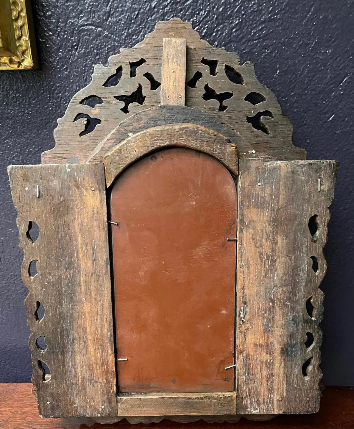 A Pair of Small Carved Mirrors