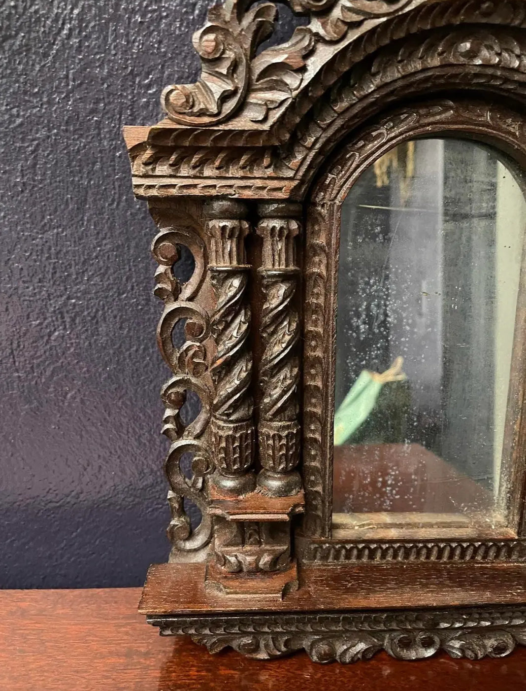 A Pair of Small Carved Mirrors
