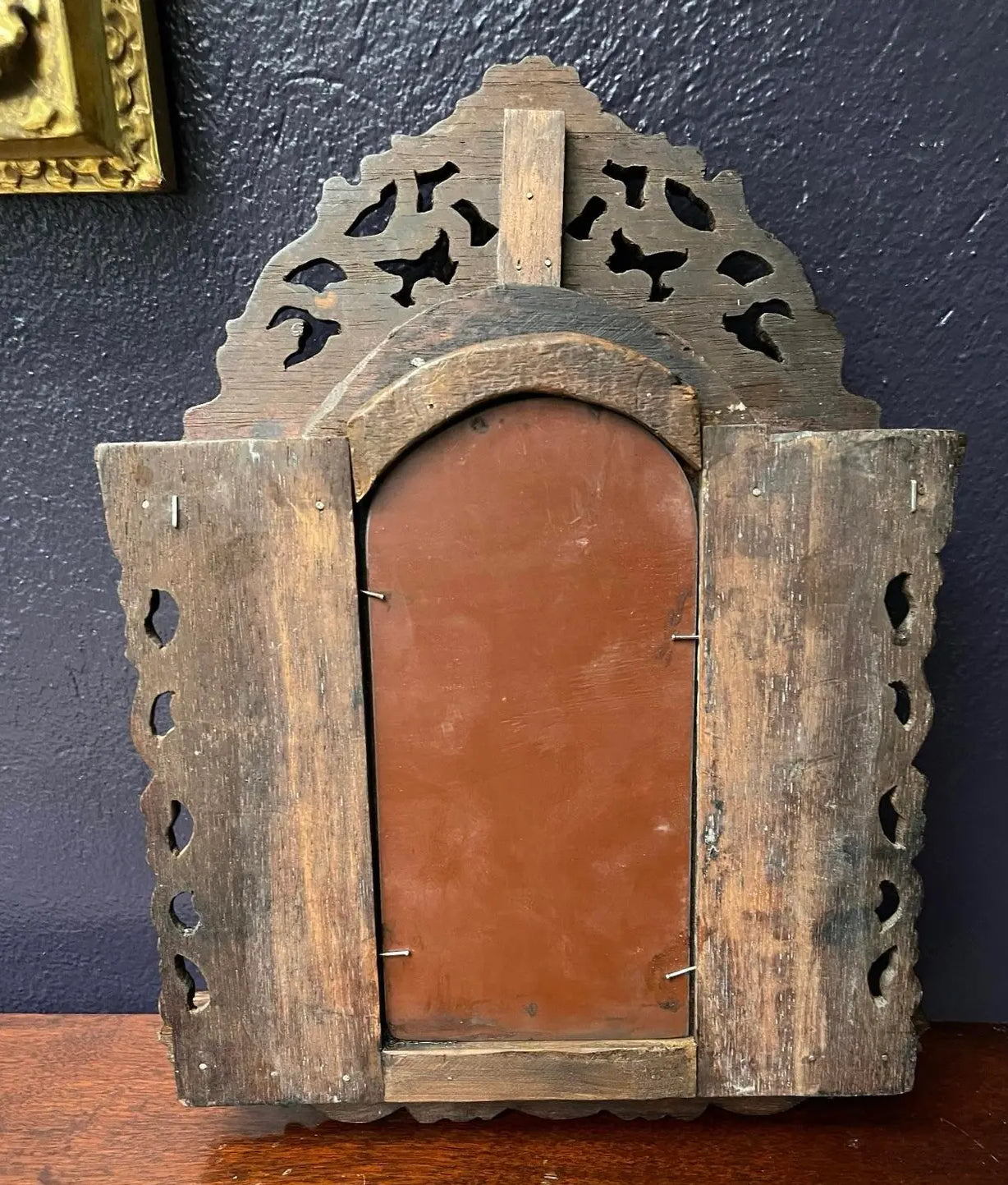 A Pair of Small Carved Mirrors