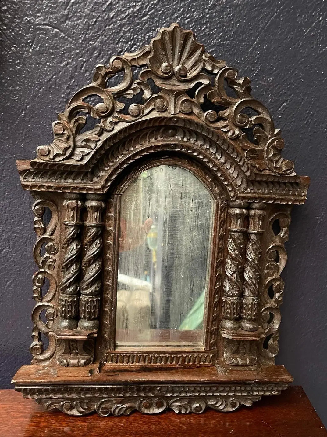 A Pair of Small Carved Mirrors