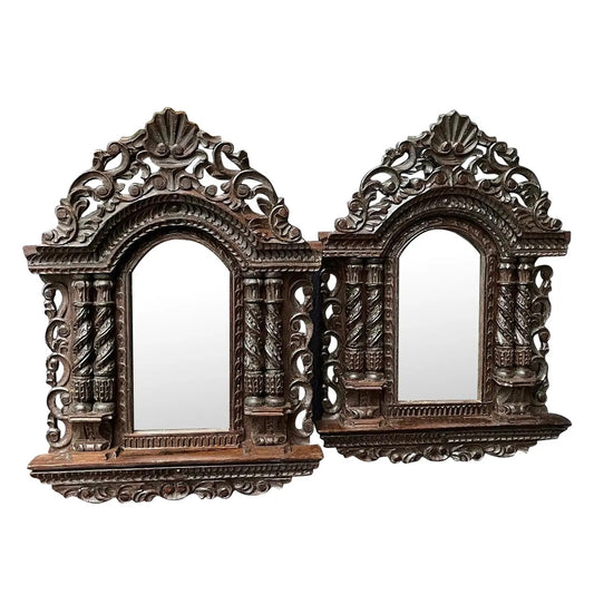 A Pair of Small Carved Mirrors
