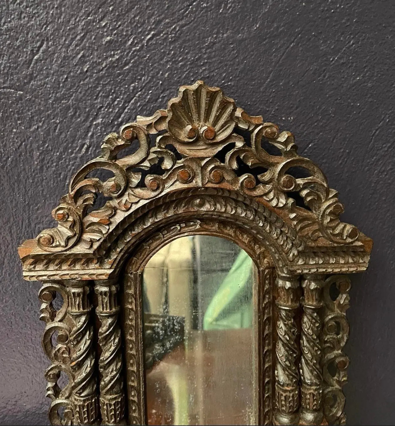 A Pair of Small Carved Mirrors
